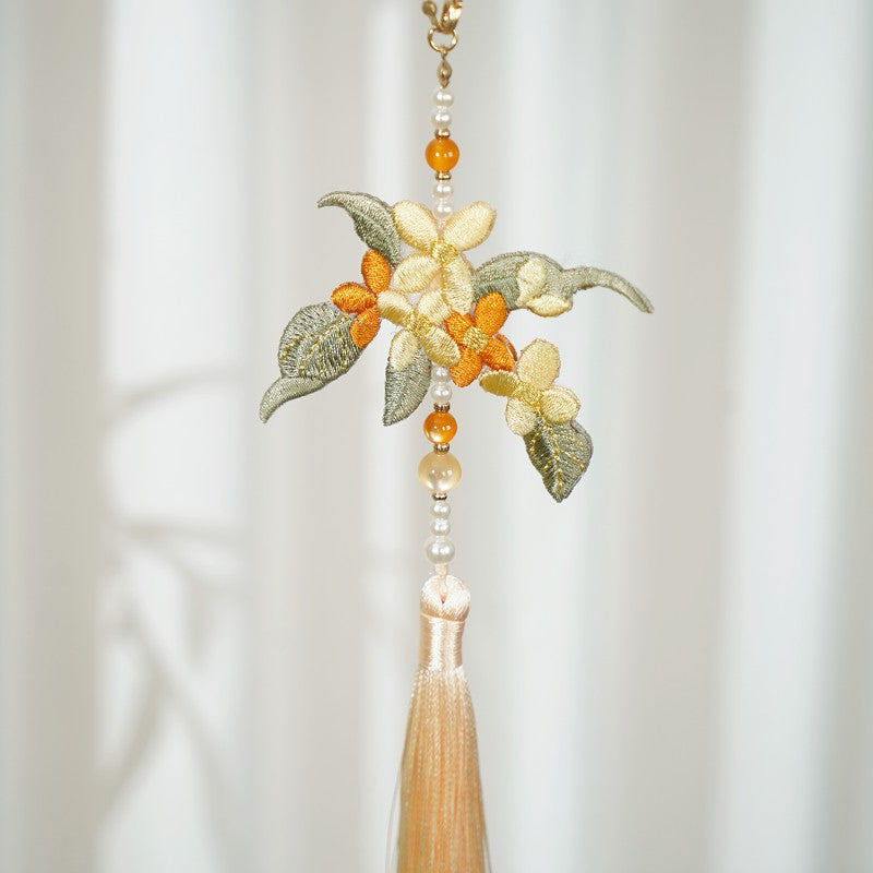 Embroidered pendant